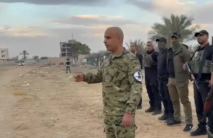 غسان الدهيني ومسلحين